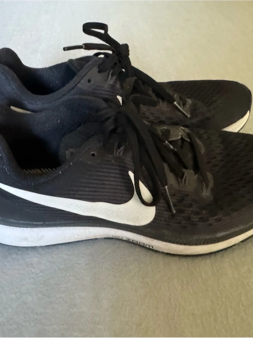 Nike Black Athletic Running Shoes with White Swoosh